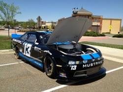 A car with the hood open

Description automatically generated with medium confidence